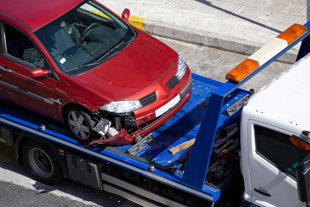 crashed car loaded on a tow truck 2023 11 27 05 25 22 utc 1024x682