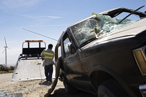 crashed car tow truck